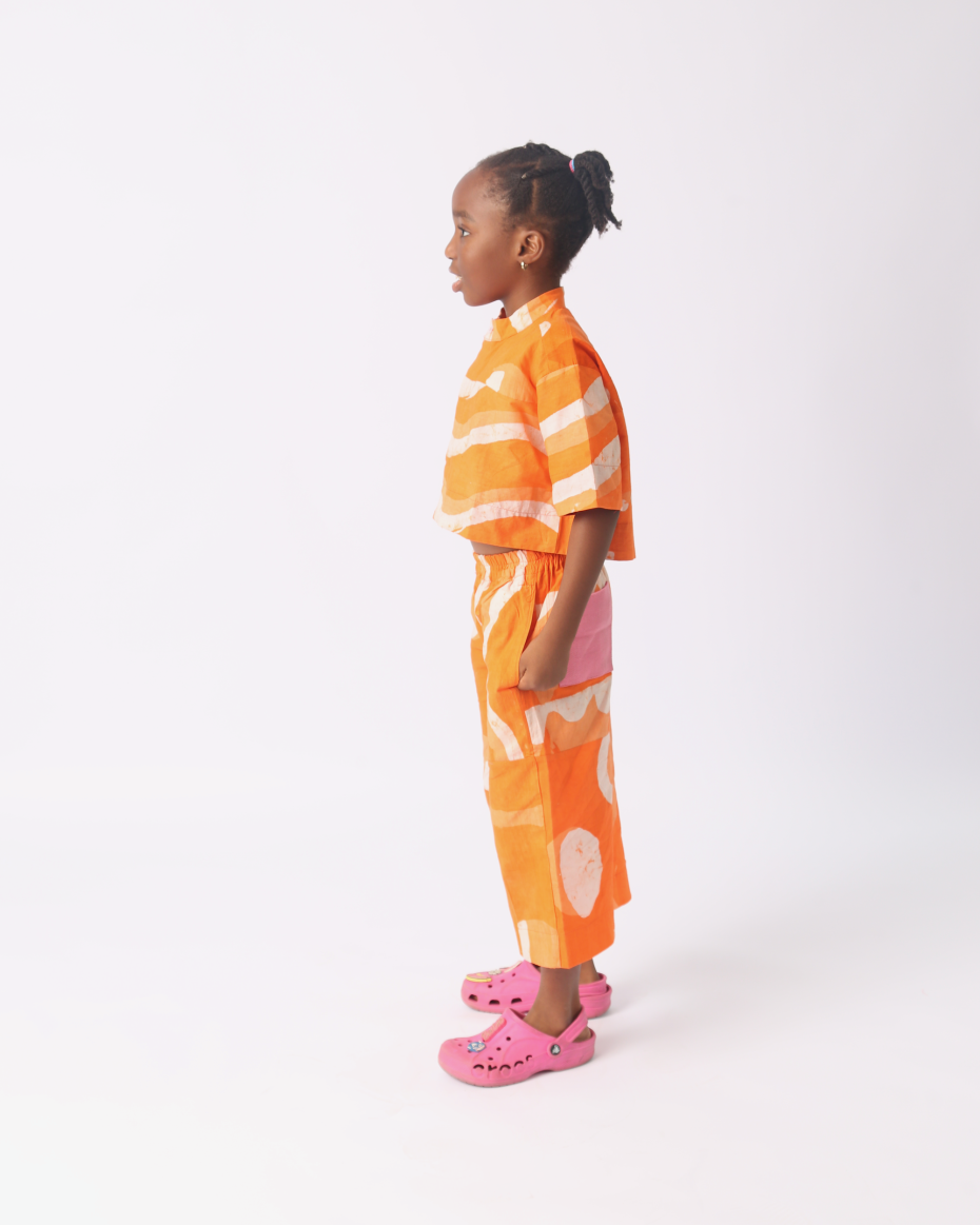 KIDS WHITE AND TANGERINE MULTIPRINT CULOTTES