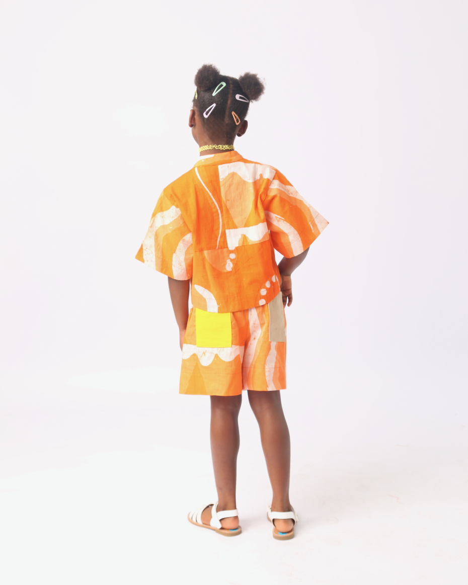 KIDS WHITE AND TANGERINE MULTIPRINT CROP SHIRT