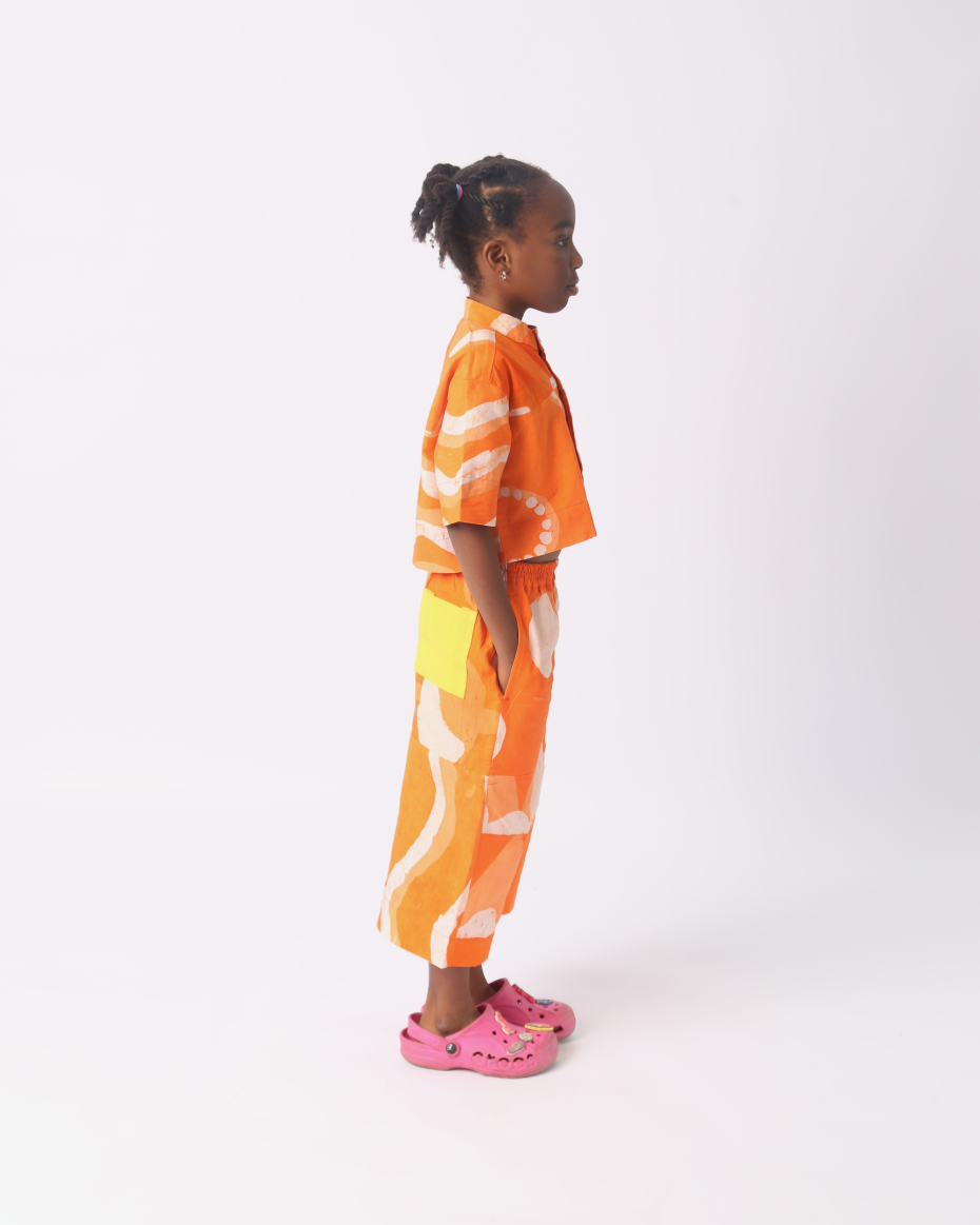 KIDS WHITE AND TANGERINE MULTIPRINT CROP SHIRT