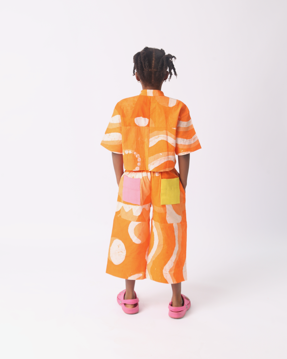 KIDS WHITE AND TANGERINE MULTIPRINT CROP SHIRT